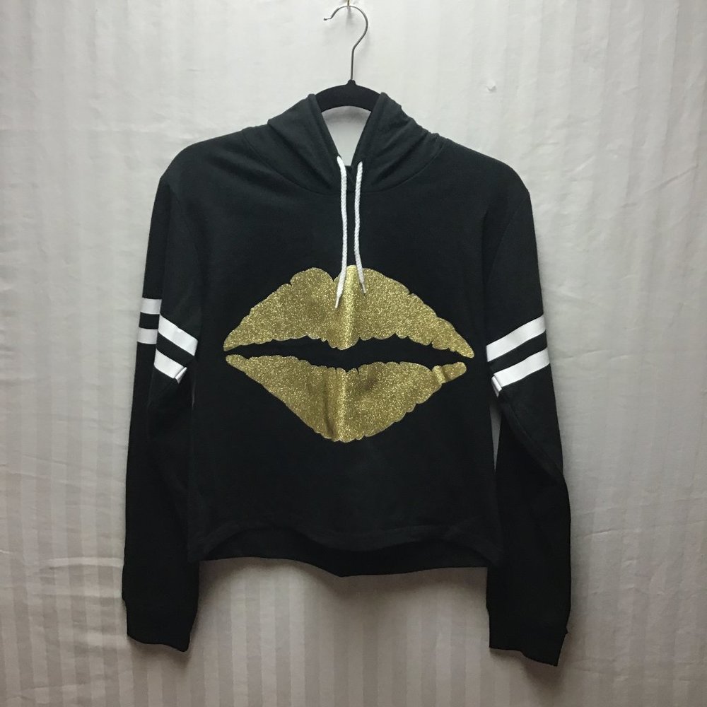 On Fire juniors black & white with gold lips jersey size is a large.